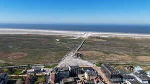 Aerial view of the endless sandy beach and the North Sea coast in Sankt Peter Ording - perfect for a relaxing getaway